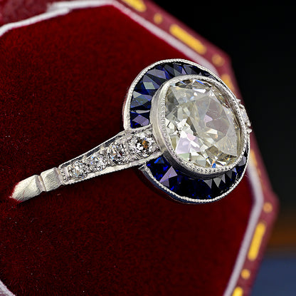 1.10ct Old Mine Cut Diamond and Sapphire Target Engagement Ring in Platinum
