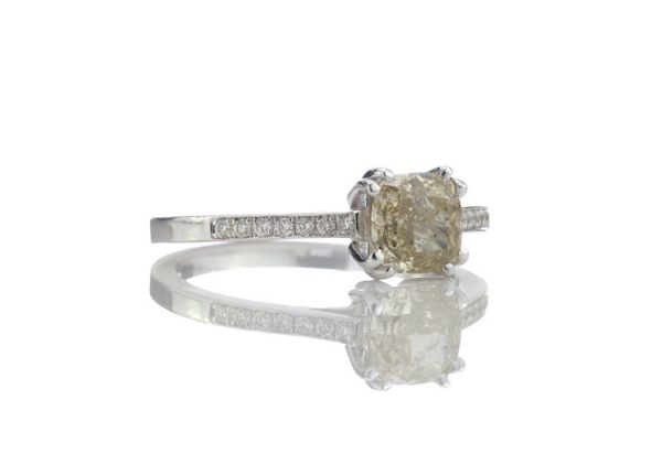 Cushion Cut Fancy Yellow Diamond Engagement Ring, 1.24 carats, diamond set shoulders, with certificate. Circa 1990s.