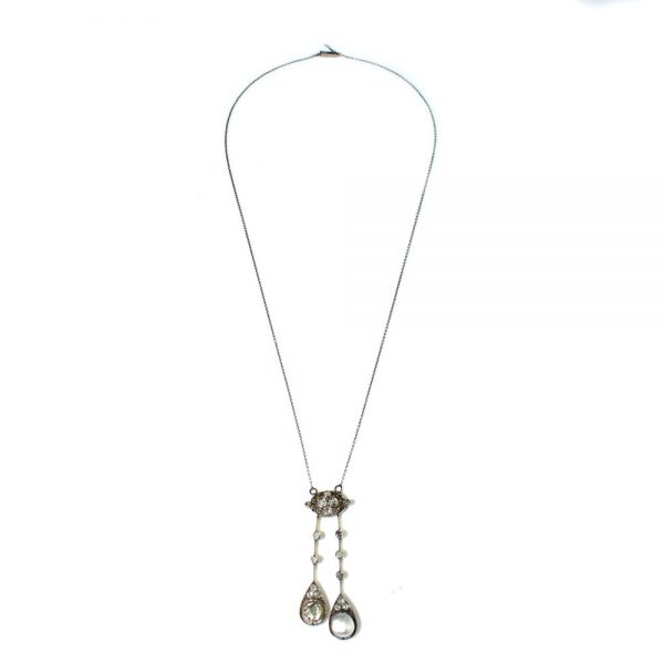 Antique Edwardian Natural Pearl and Old Cut Diamond Negligee Necklace; drop pendant set with natural pearl and 2.09cts old-cut diamonds, in 18ct gold. Circa 1910, on later added chain