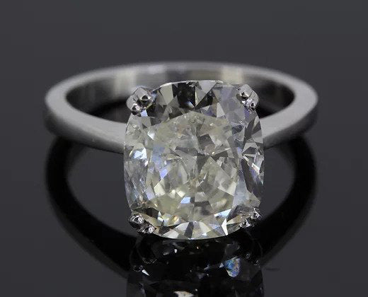 Cushion Cut 5.11 carat Diamond Solitaire Engagement Ring; featuring a stunning 5.11ct cushion-cut diamond, four double-claw set, mounted in 18ct white gold.