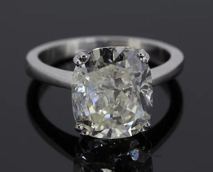 Cushion Cut 5.11 carat Diamond Solitaire Engagement Ring; featuring a stunning 5.11ct cushion-cut diamond, four double-claw set, mounted in 18ct white gold.