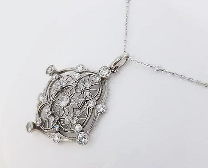 Antique Old Cut Diamond set Pendant; openwork pendant set with old cut diamonds, 18ct white gold.
