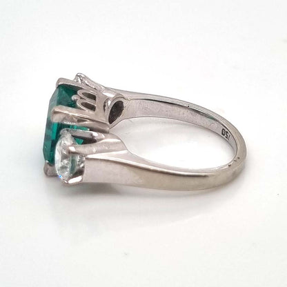 2.36ct Square Step Cut Emerald and 1.50ct Diamond Three Stone Trilogy Engagement Ring in 18ct White Gold