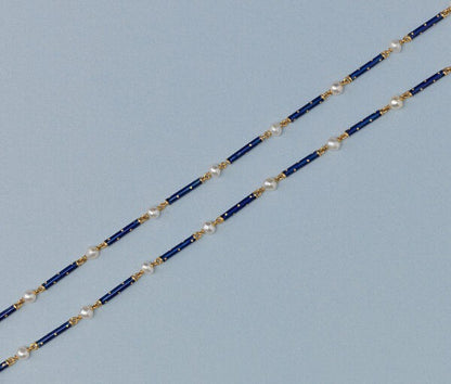 Antique Victorian Natural Pearl and Blue Enamel Long Chain Necklace; alternating natural pearls and royal blue enamel on 18ct yellow gold sticks. France, circa 1890.