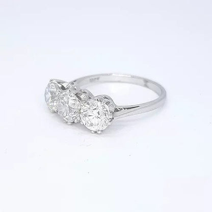 3.06ct Diamond Three Stone Ring; impressive diamond trilogy ring featuring three circular diamonds, 3.06 carat total, in 18ct white gold