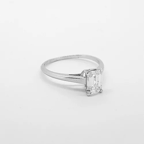 Emerald Cut Diamond Solitaire Engagement Ring; 1.00 carat diamond single stone ring, claw set and mounted in 18ct white gold