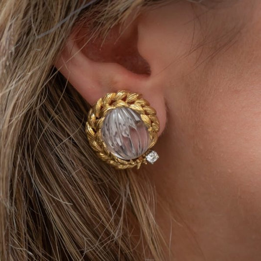 Vintage David Webb Rock Crystal, Diamond and Gold Earrings; melon cut carved rock crystal with gold leaf style garland surrounds and round brilliant-cut diamond accents, Signed, Circa 1980