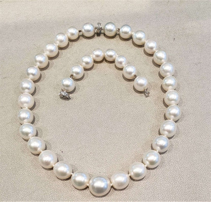 Vintage South Sea Pearl Graduated Necklace, with two diamond set clasps to allow the necklace to be worn at 16 inches and 20 inches. Circa 1990s