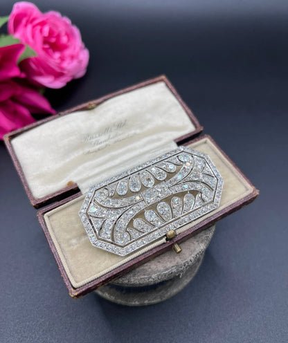 Antique Platinum, Edwardian era 10 Carat Diamond Openwork Brooch