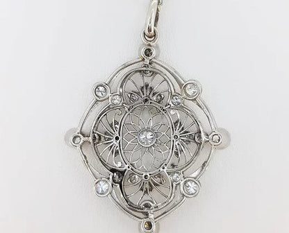 Antique Old Cut Diamond set Pendant; openwork pendant set with old cut diamonds, 18ct white gold.