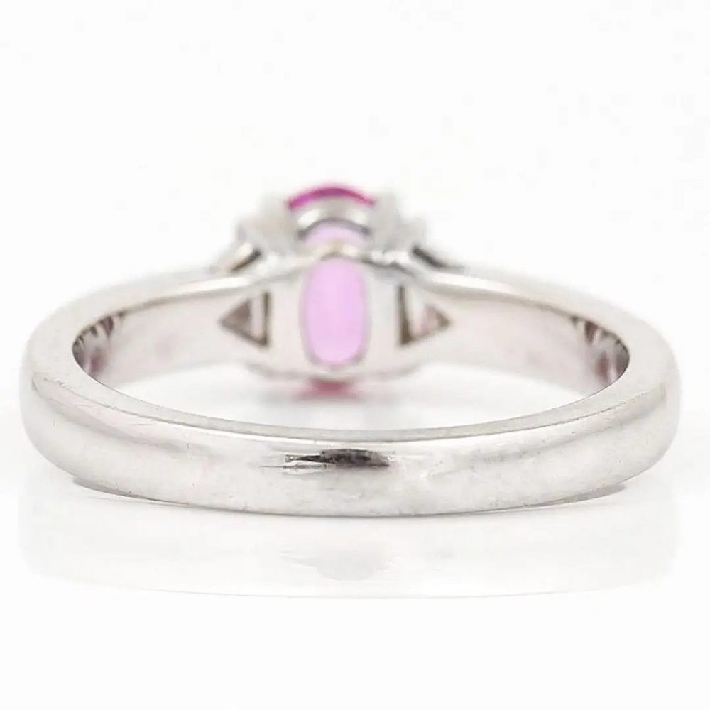 0.84ct Pink Sapphire and Trilliant Diamond Three Stone Ring in 18ct White Gold
