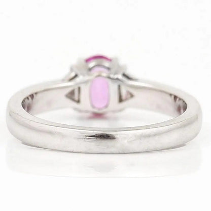 0.84ct Pink Sapphire and Trilliant Diamond Three Stone Ring in 18ct White Gold