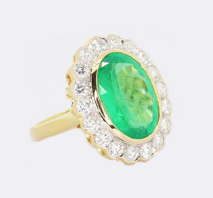 5.14ct Emerald and Diamond Oval Cluster Ring in 18ct Gold