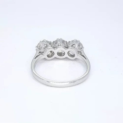 3.06ct Diamond Three Stone Ring; impressive diamond trilogy ring featuring three circular diamonds, 3.06 carat total, in 18ct white gold