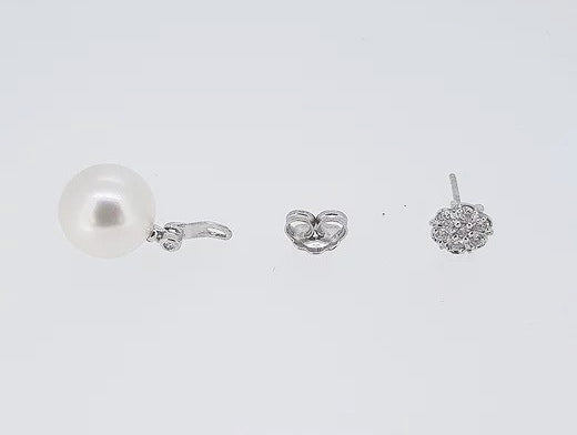 South Sea Pearl and Diamond Drop Earrings; featuring South Sea pearls suspended from cluster diamond studs. Mounted in 18ct white gold.