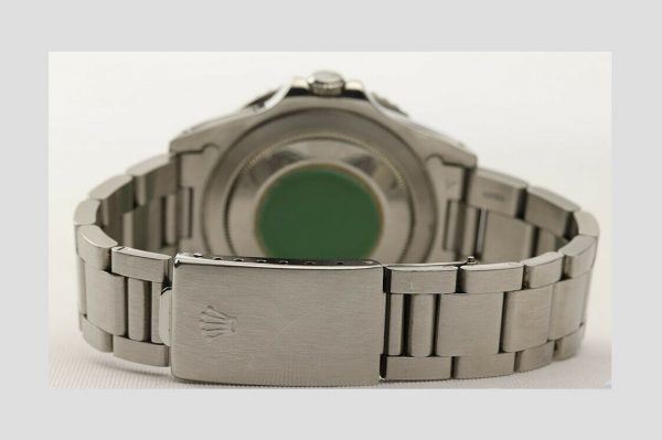 Rolex GMT Master 16700 Stainless Steel 40mm Automatic Watch, black dial, Pepsi red and blue rotating bezel, 24 hour hand, date indicator and sapphire crystal. Stainless steel Oyster bracelet. With Rolex box and papers. Purchased in 1996.