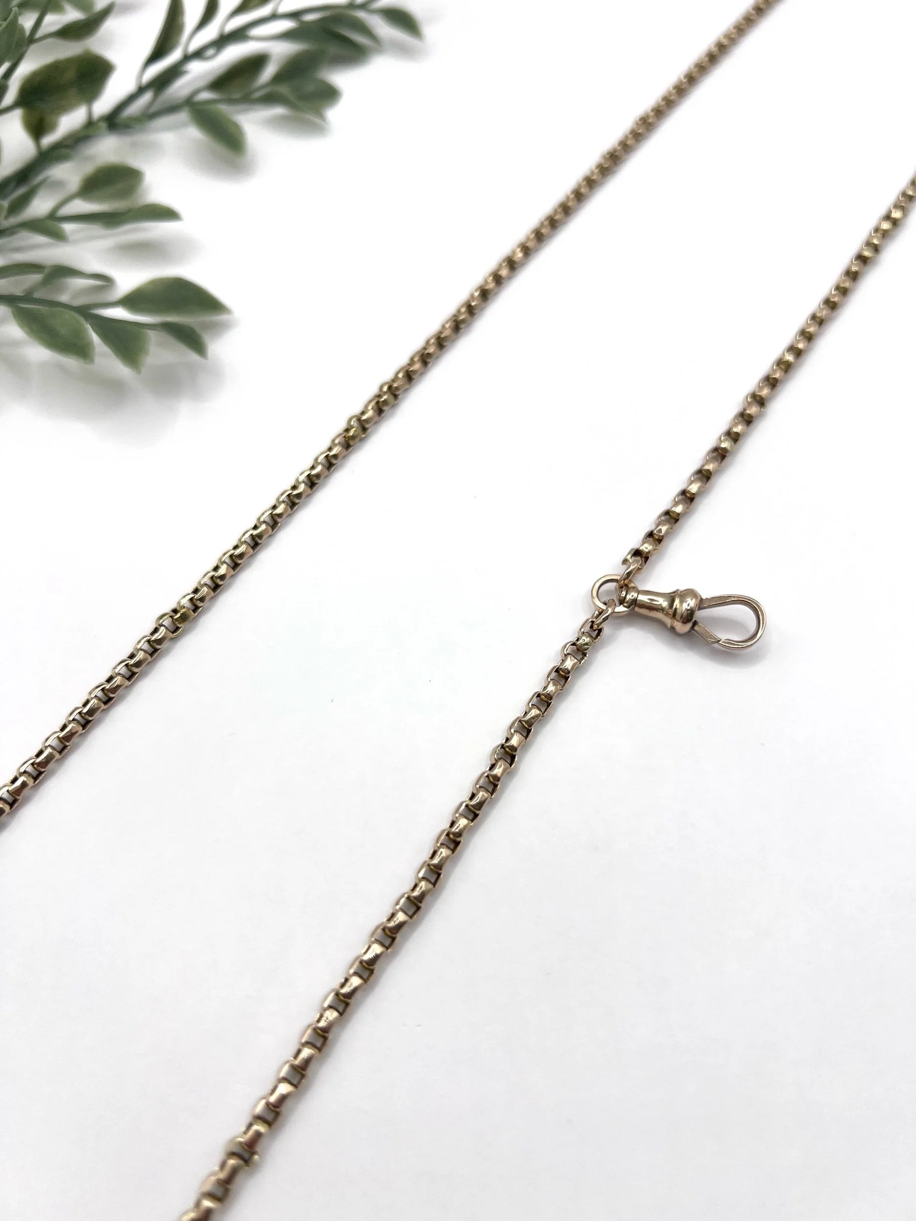 A long rose gold link necklace with swivel clasp