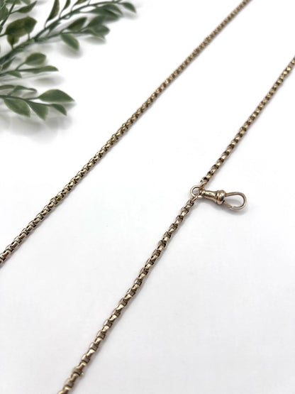 A long rose gold link necklace with swivel clasp