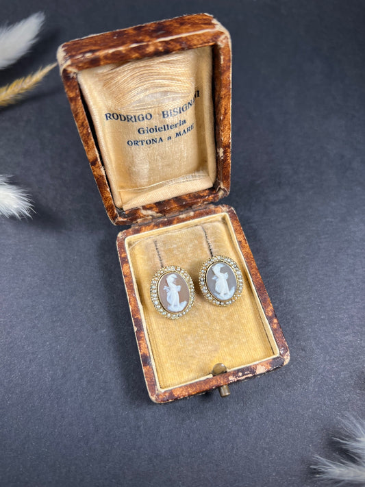 A pair of yellow gold oval shell cameo earrings, in an antique box