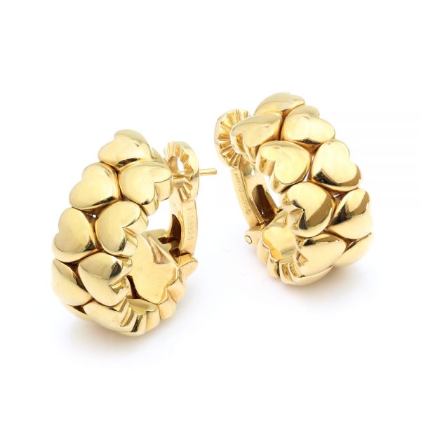 Cartier 18ct Yellow Gold Heart Earrings; half hoop design comprised of multiple hearts, post and clip fittings, Signed and Numbered, Circa 1994, in original box