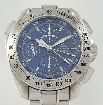 Omega Speedmaster Split Seconds Chronograph Automatic Gentleman's Wrist Watch, 42mm stainless steel case, blue dial, luminous hands, sapphire crystal, stainless steel bracelet strap. In mint condition, with Omega box.