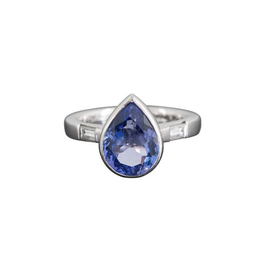 4.13ct Pear Shaped Tanzanite and Diamond Ring; central 4.13 carat pear-shaped tanzanite flanked by 0.39cts baguette-cut diamonds, in platinum