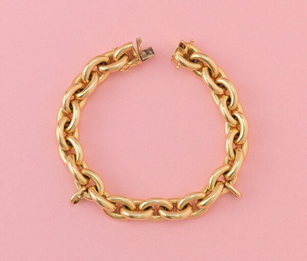 Vintage French 18ct Yellow Gold Link Bracelet, with two large links for charms and a hidden lock. France, Circa 1980.