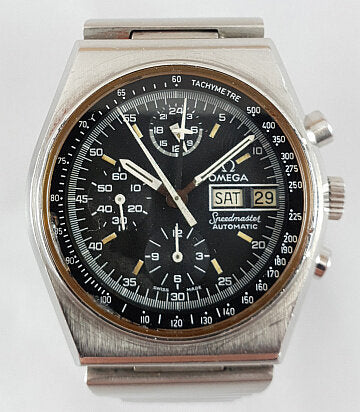 Vintage 1970's Omega Speedmaster 40mm Automatic Chronograph Steel Watch; black dial, protected by mineral crystal, bar-style steel bracelet strap