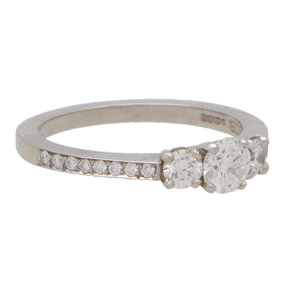 Modern Diamond Three Stone Engagement Ring With Diamond Shoulders in Platinum