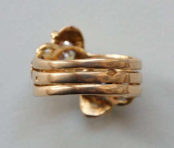 Antique Edwardian Diamond, Sapphire and 18ct Yellow Gold Double Snake Ring; set with a 0.45ct old cut diamond and 0.43ct cushion cut sapphire