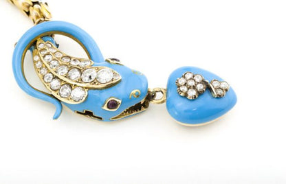 Antique Victorian Blue Enamel and Old Cut Diamond Snake Necklace; with blue enamel and diamond heart mourning pendant locket, 1.86 carat total, 18ct yellow gold, Circa 1860s.