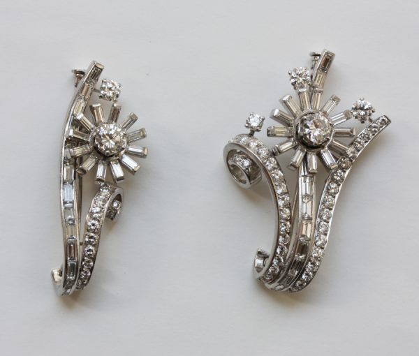 Vintage 9.50ct Diamond and Platinum Floral Spray Double Clip Brooch; two flowers set with baguette and brilliant-cut diamonds, flowers can separated, 1950s
