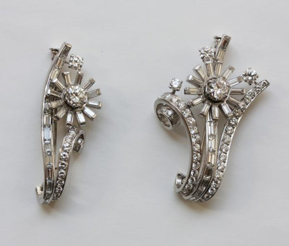 Vintage 9.50ct Diamond and Platinum Floral Spray Double Clip Brooch; two flowers set with baguette and brilliant-cut diamonds, flowers can separated, 1950s
