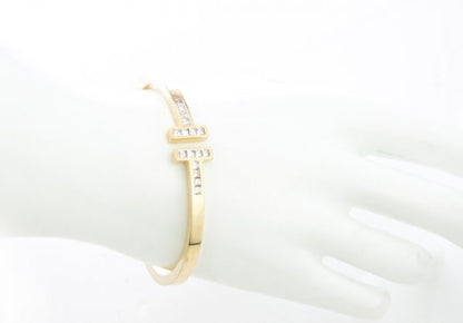 Tiffany and Co 18ct Yellow Gold Double T-Bar Bangle with 1.60cts Princess Cut Diamonds
