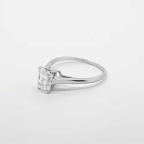 Emerald Cut Diamond Solitaire Engagement Ring; 1.00 carat diamond single stone ring, claw set and mounted in 18ct white gold