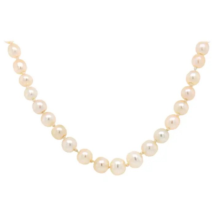 Art Deco Natural Saltwater Pearl Necklace with Diamond Clasp, composed of 100 natural saltwater pearls with geometric design diamond set clasp, Circa 1920s