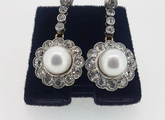 Vintage Pearl and Diamond Cluster Drop Earrings; featuring cultured pearls surrounded by 2.80cts old-cut diamonds. Mounted in 18ct gold
