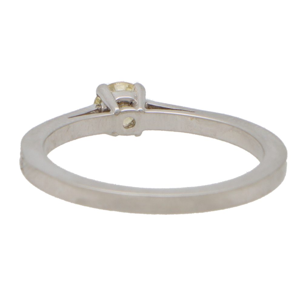 Modern Yellow Diamond Solitaire Engagement Ring with White Diamond Shoulders