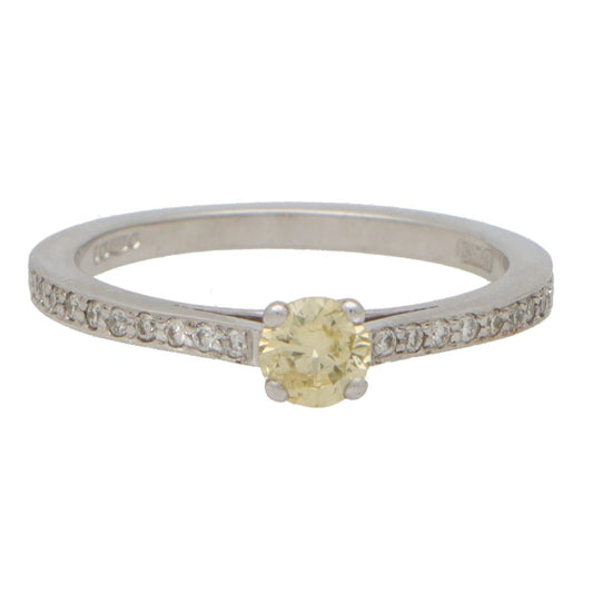 Modern Yellow Diamond Solitaire Engagement Ring with White Diamond Shoulders