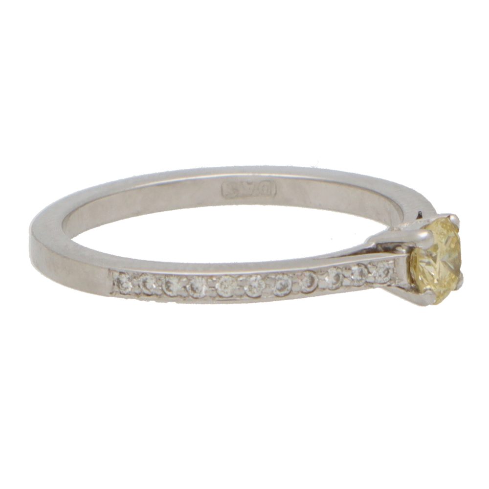Modern Yellow Diamond Solitaire Engagement Ring with White Diamond Shoulders