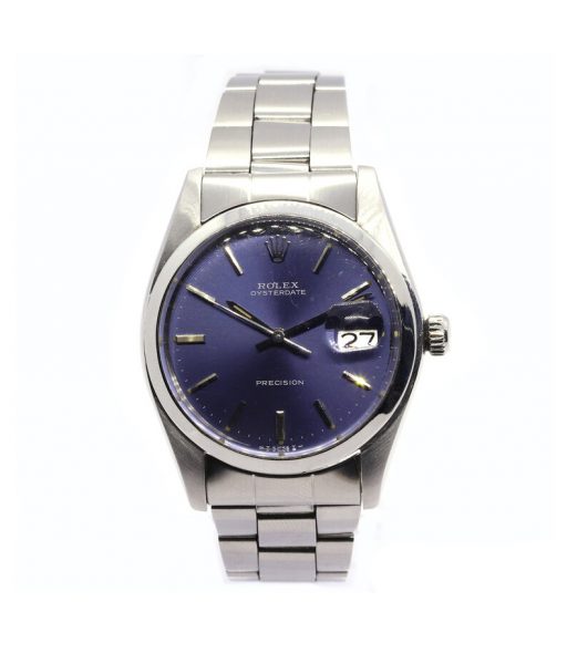 Vintage Rolex Oysterdate Precision 6694 Steel Manual Watch, 34mm stainless steel case with blue dial with baton hour markers, date aperture at 3 o'clock, screw-down Rolex crown and plexiglass crystal, on a Rolex stainless steel Oyster bracelet with fold-over clasp, Circa 1973