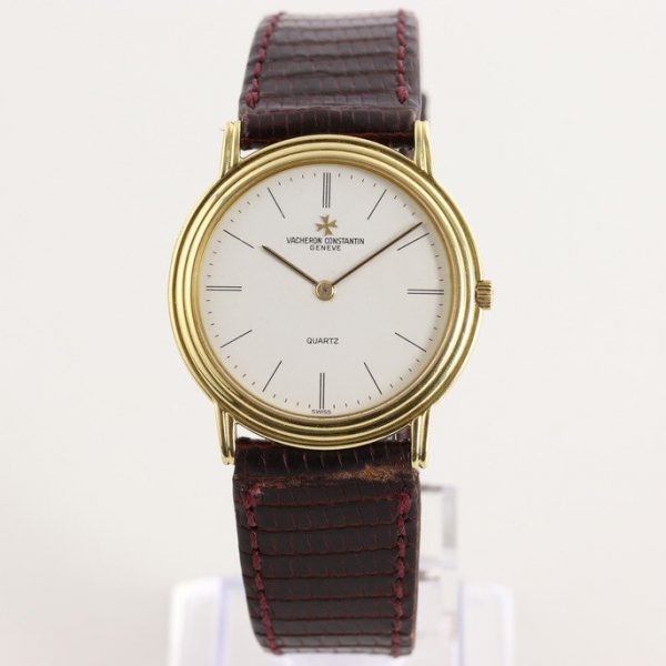 Vacheron Constantin Vintage 18ct Yellow Gold Quartz Watch; with white dial, on a dark purple leather strap with 18ct yellow gold pin buckle, Circa 1990s