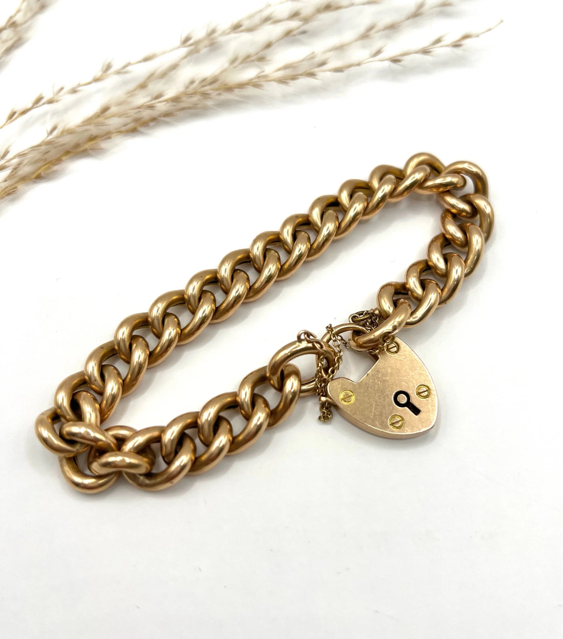 Victorian 15 Carat Rose Gold Curb Link Bracelet with Heart Padlock Clasp, Circa 1880
