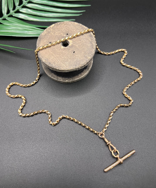 A rose gold tulip link chain necklace with a dog clip clasp and T-bar
