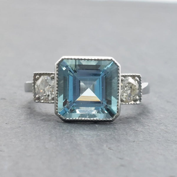 3ct Octagonal Cut Aquamarine and Diamond Three Stone Ring in Platinum