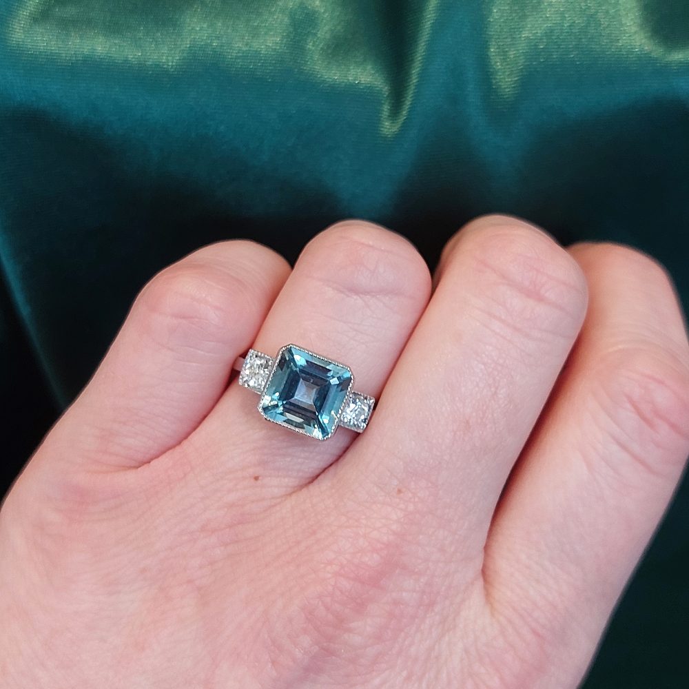 3ct Octagonal Cut Aquamarine and Diamond Three Stone Ring