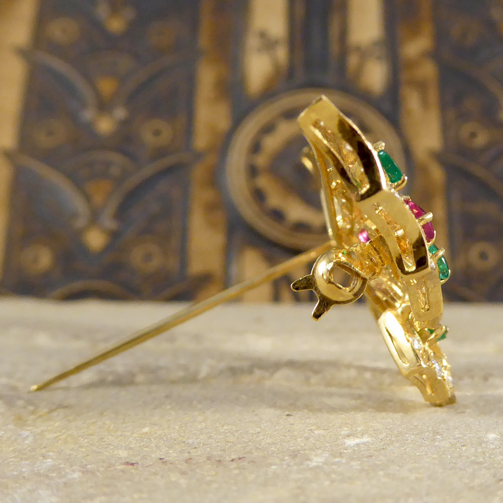 Contemporary diamond emerald ruby and sapphire butterfly brooch in 18ct gold