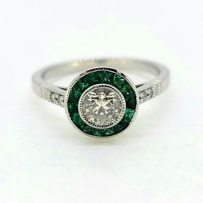 0.51ct Diamond and Emerald Target Cluster Engagement Ring