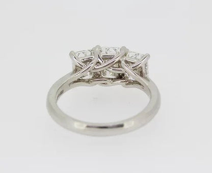 Emerald Cut 2.46ct Diamond Three Stone Ring in Platinum; a striking trilogy ring featuring three emerald-cut diamonds, 2.46 carats, Colour 'H', Clarity 'VS'
