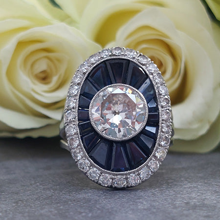 1.72ct Diamond and Calibre Sapphire Target Cluster Ring